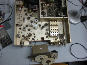 I have removed the VFO to clean, lub, and adjust the gear train. This radio had excessive backlash and binds. Removing the VFO from the SR-2000 is fairly simple and while it's on the bench, you can clean the 500Kc and 1Kc dials and if they are too discolored or pealing, place a photo image that has been clear coated over them.